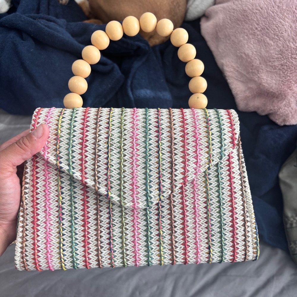 Multi color woven bag with long strap and handle